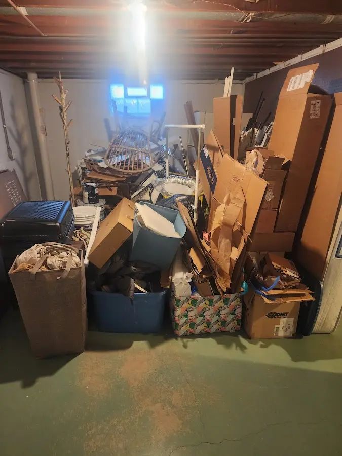 Roll-off dumpster container at job site for Concrete Dumpster Rental in Plainview